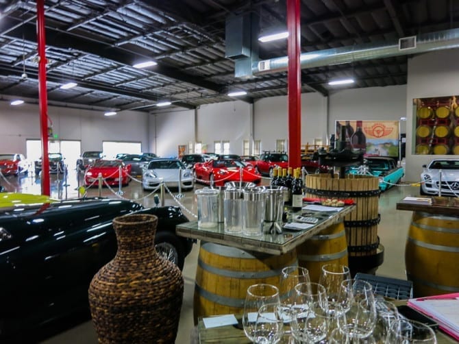 AutoVino has an incredible collection of cars. While browsing, you can taste of some their wine as well.